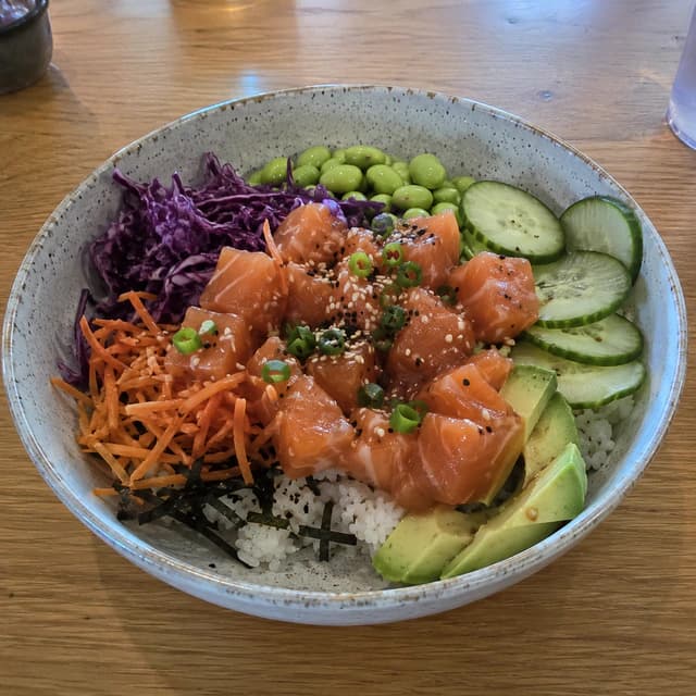Original restaurant photo of a salmon poke bowl